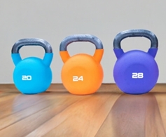 Kettlebells with coatings to protect floors